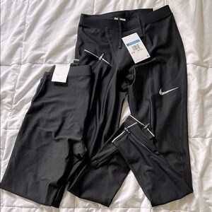 Nike tight fit Black Leggings with Silver Logo running gym